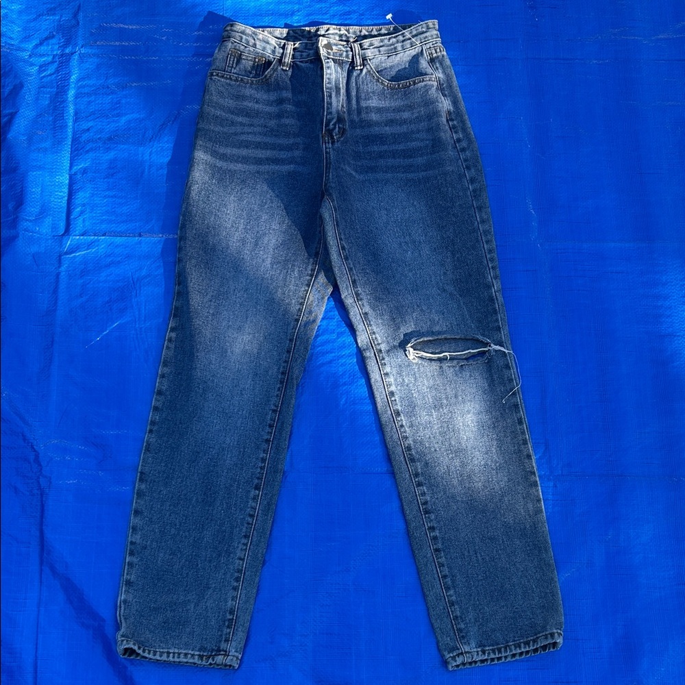 Distressed Blue Denim Jeans